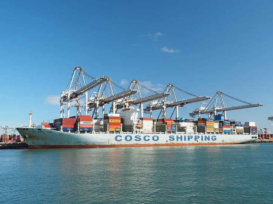 Container ship loaded with cargo at port