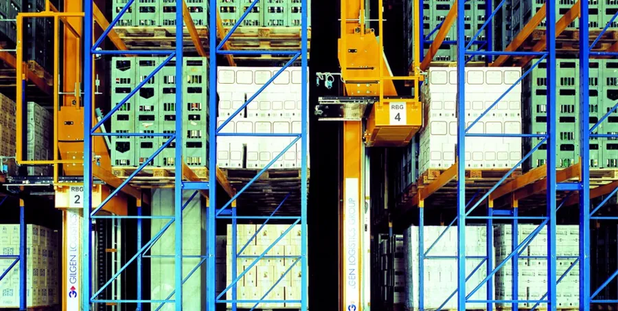 Automated high-bay warehouse with storage and retrieval systems